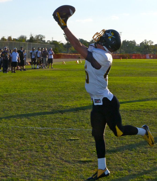 Mission Bay senior receiver Kelly Weese makes a stretching attempt to haul in a pass in the end zone