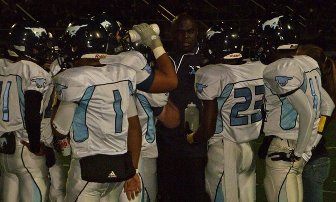 Otay Ranch's offense talks things over during a timeout