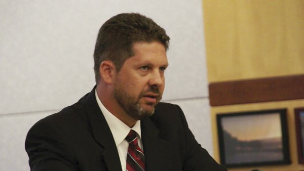 Defense attorney Andrew Limberg argued the crime down from assault on a police officer to negligent discharge of a firearm and other lesser charges.