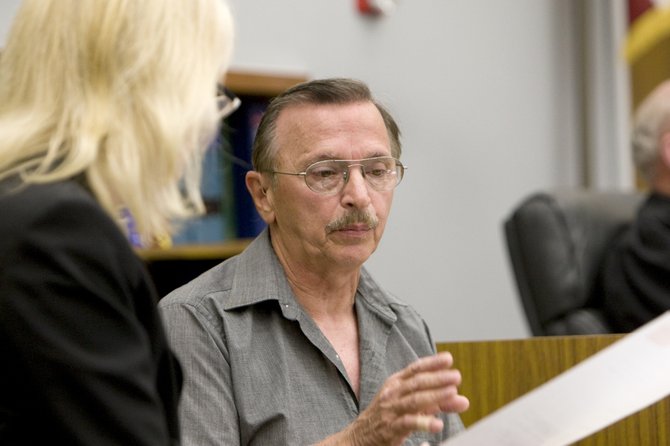 Prosecutor with stepdad Donald Chaffee in the witness box.  Photo Weatherston.