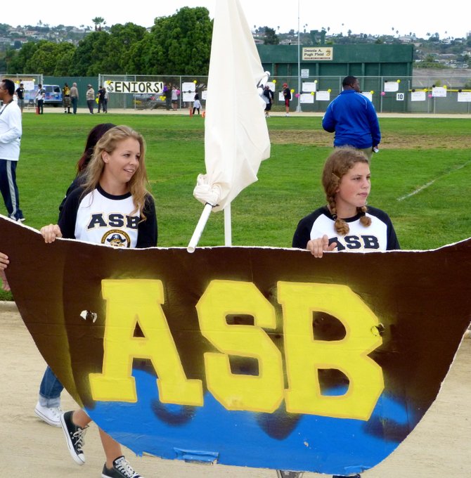 Members of Mission Bay's Associated Student Body set sail on the track during Homecoming halftime festivities