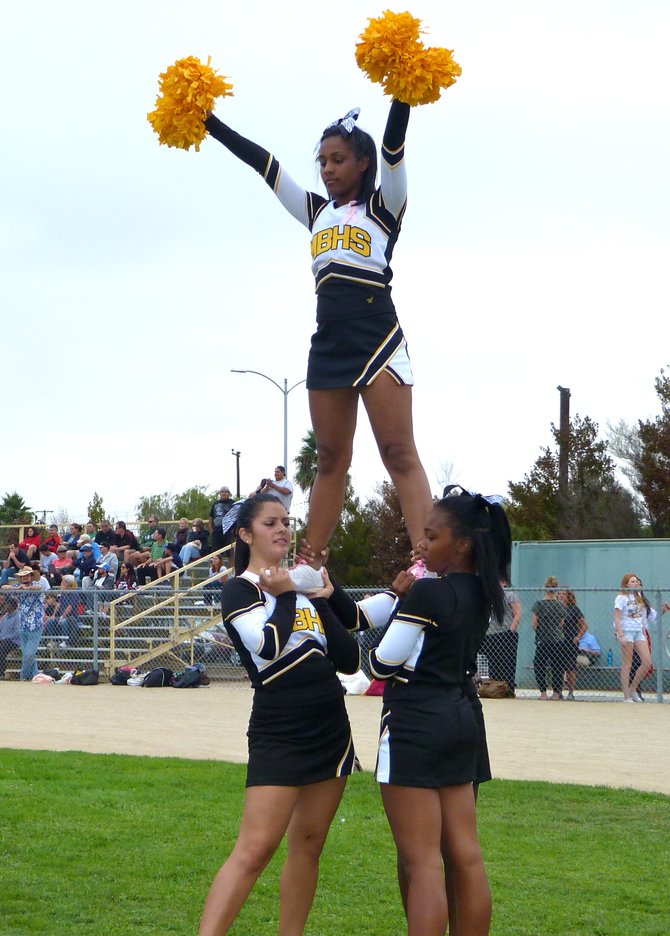 Mission Bay cheerleaders celebrate a Buccaneers touchdown