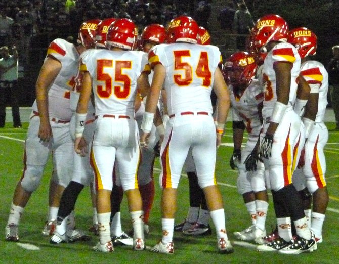 Cathedral Catholic in the offensive huddle