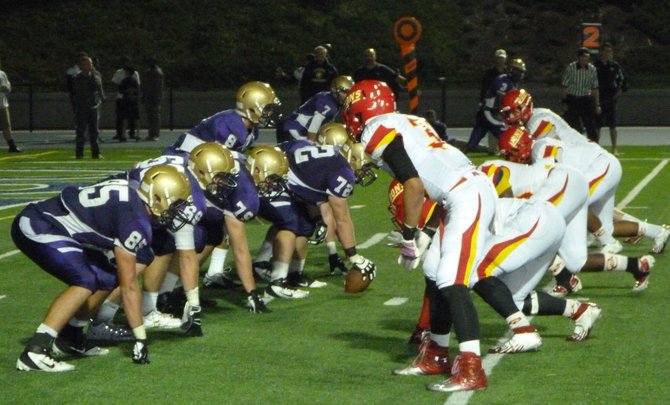 The Holy Bowl line of scrimmage between St. Augustine and Cathedral Catholic