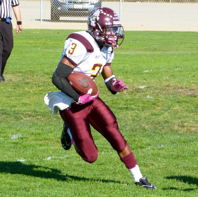 Point Loma junior running back D.J. Lacy carries the ball