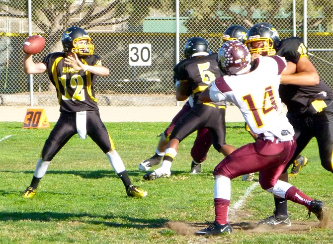 Mission Bay junior quarterback Nick Plum fires a pass from the pocket