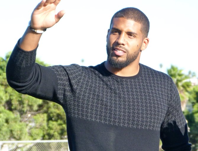 Houston Texans running back Arian Foster acknowledges the crowd at Mission Bay