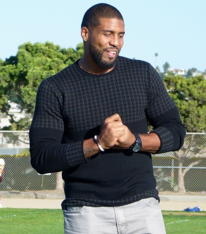 Houston Texans running back Arian Foster has a laugh during his jersey retirement ceremony at Mission Bay
