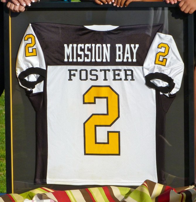 Mission Bay presented Houston Texans running back Arian Foster with a plaque featuring his retired Buccaneers jersey