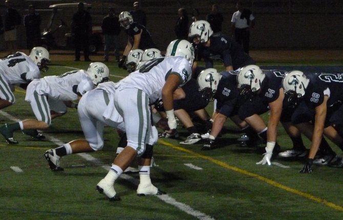 La Costa Canyon's offense lines up across from Oceanside's defense