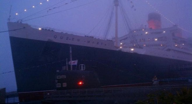Queen Mary in the fog: the retired British ocean liner is rumored to be the site of paranormal activity. 