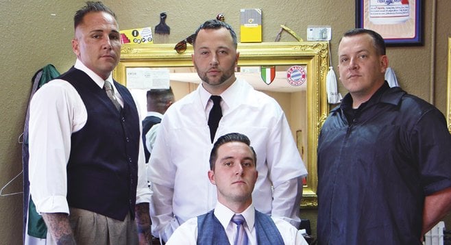 The barbers at dapper jays, where the beer runs cold and men can be men. - Image by Howie Rosen