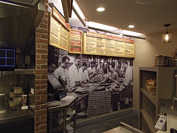 A photo of a long-ago fish market fills most of the back wall.