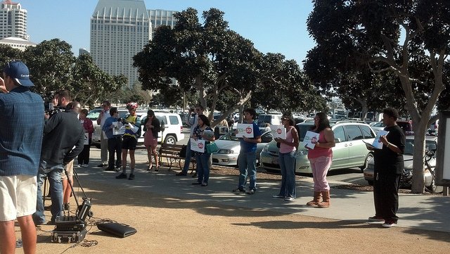 The gathering drew nearly as many Prop 30 backers as opponents