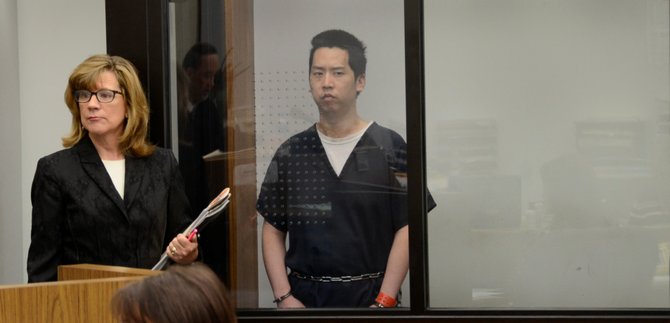 Defender Kathleen Cannon and Bryan Chang in court.  Photo Weatherston.