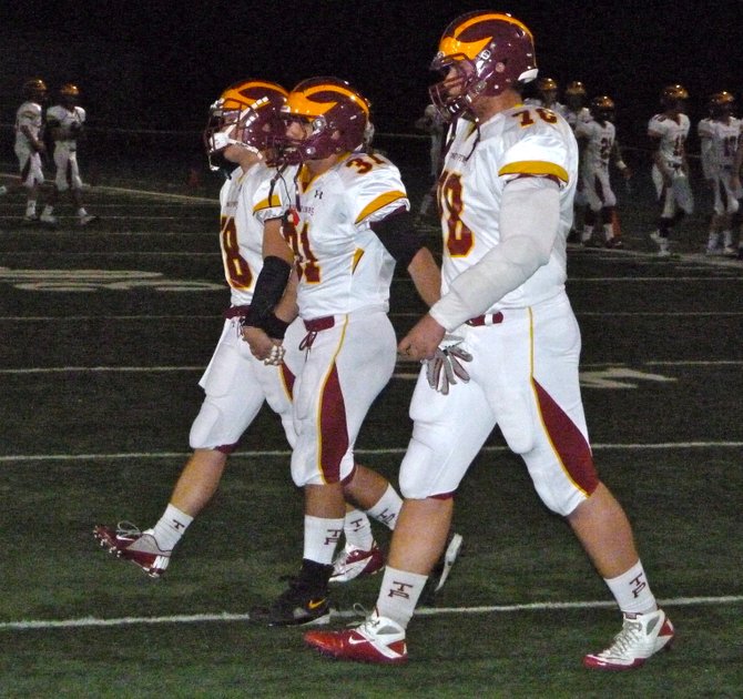 Torrey Pines team captains take the field before the Division I quarterfinals