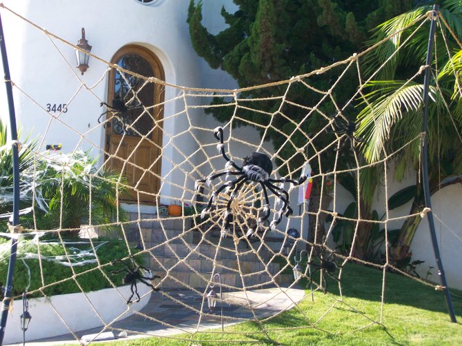 Giant Halloween spider web at house on Elliott St. in Point Loma.