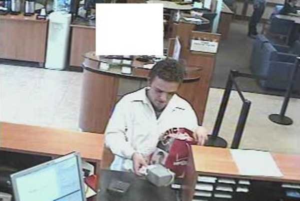Imperial Beach Chase Bank robbery suspect places small gray box with wires protruding on counter and demands money from teller suggesting the box contains explosives. Photo Credit: FBI