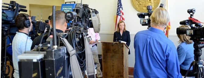 Prosecutor Katherine Flaherty spoke to news media.  Photo Weatherston