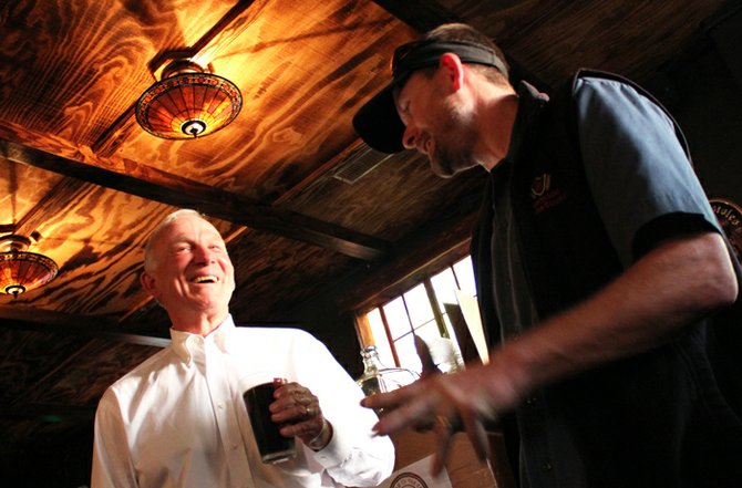 San Diego Brewers Guild president Shawn DeWitt of Coronado Brewing Company shares a laugh with Jerry Sanders