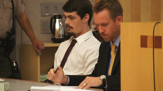 Taylor Jensen and atty Lance Rogers.  Photo Weatherston
