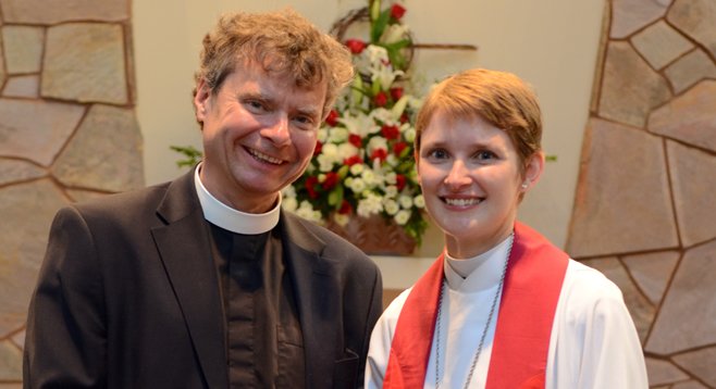 Chris Chase (with associate pastor Rebecca Edwards) is sad “that people are losing touch with who they are — the children of God.”