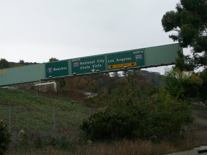 Freeway signs along Interstate 8 West in Mission Valley.