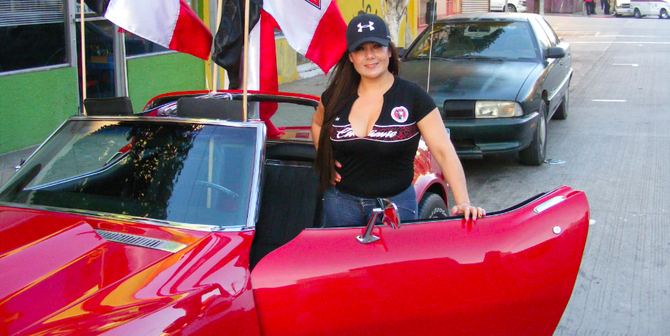 Xolos fan and her red '72 Corvette
