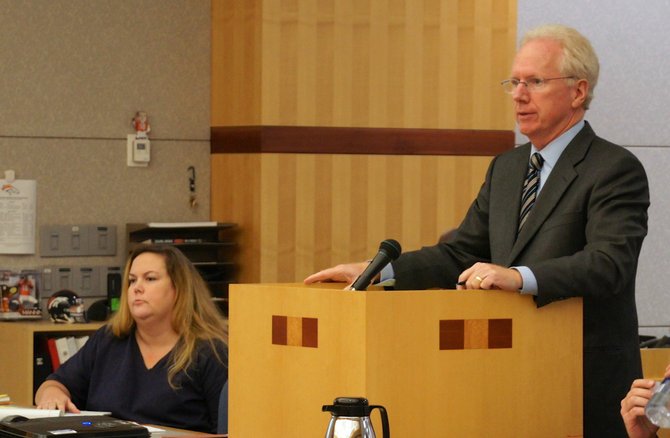 Julie Harper and defense attorney Paul Pfingst.   Photo Weatherston.