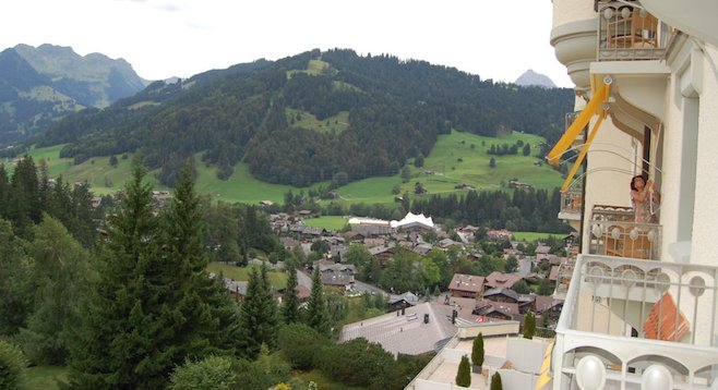 Among Gstaad Palace's amenities are private balcony panoramas of the Swiss Alps.