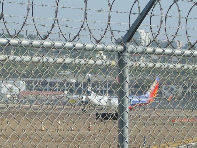Soujwest Airlines getting ready to take off behind the fence at SD Int'l Airport.