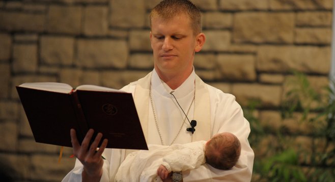 Pastor Aaron Boehm with his then-newborn son Garret Daniel