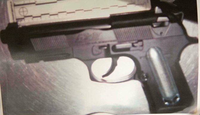 Evidence photo of handgun used during attempted robbery.