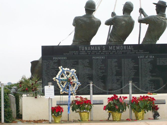 Fisherman's Memorial on Shelter Island decorated with poinsettias for the holidays.