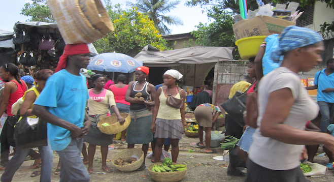 Typical street market scene in the Haitian capital.