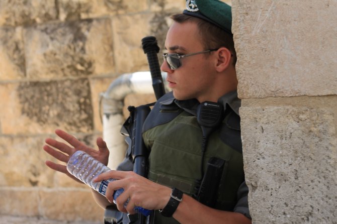 Israeli soldier standing guard in Jerusalem. 