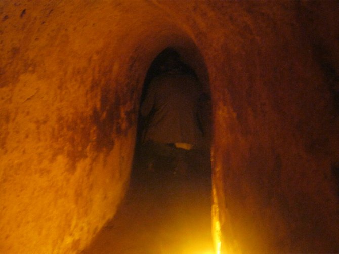 Crawling through one of the Cu Chi tunnels in Vietnam
