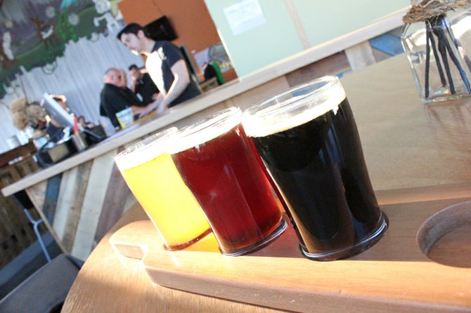 An Offbeat sampler flight (left to right): Girafficopter Pale Ale, Deer Grandpa Abbey Ale, Bear Arms Brown Ale