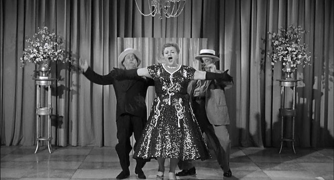 Larry Fine, Muriel 'Tiny' Landers, and Joe Besser sound the final "UHH!" in "Sweet and Hot" (1958).