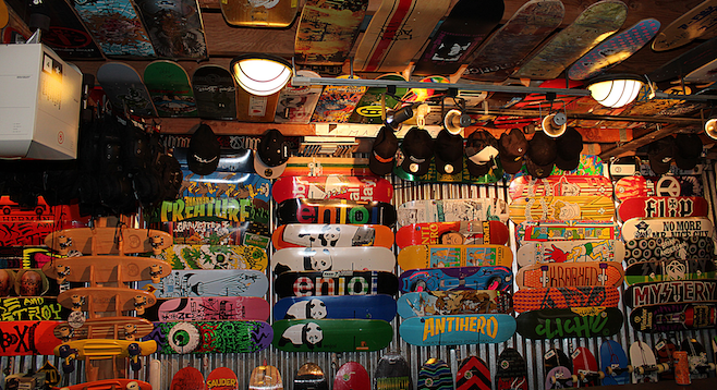 Wall-to-ceiling skateboard decks at Skatelab's museum. 