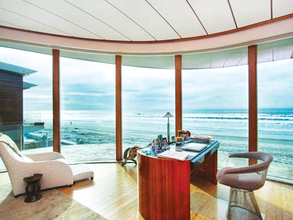 Most areas of the house, including this office space, feature sweeping ocean views. 