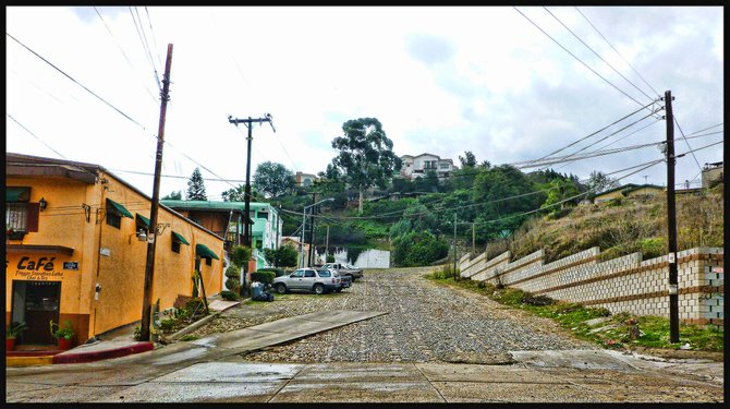 ENSENADA AVENUE LOOKING TOWARDS CAKE HILLS IN TIJUANA'S CACHO SECTION/Avenida Ensenada viendo hacia el Cerro del Pastel en la Colonia Caho de Tijuana