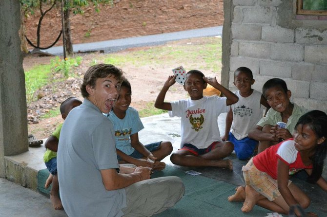Me playing cards with some local kids in Hijo de Dios. Cocle, Panama