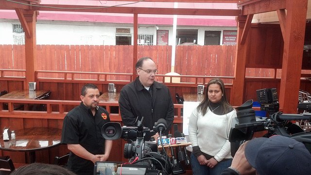 Guillermo De Santiago, K.B. Forbes, and an unknown woman erroneously identified at the press conference as De Santiago's sister Jacqueline