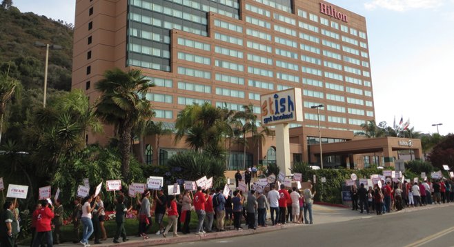 Unite Here, the union that represents hotel, gaming, and food-service workers, in front of the Mission Valley Hilton. - Image by Trinh Le