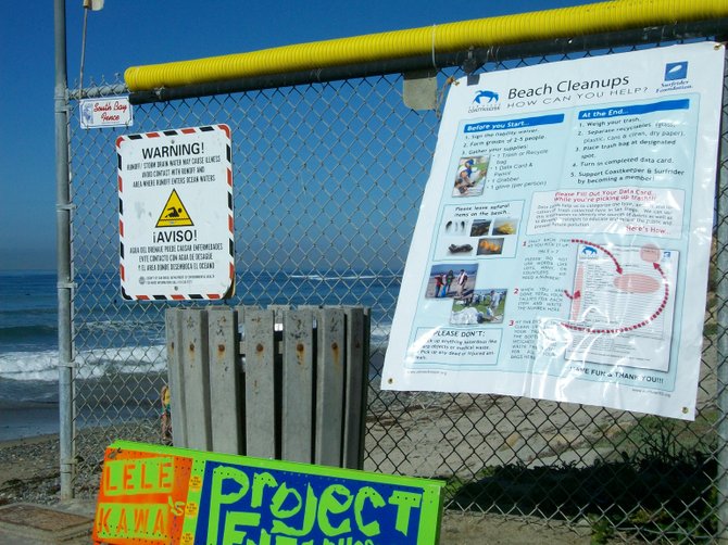 Posted Instructions on fence at Tourmaline in Pacific Beach.