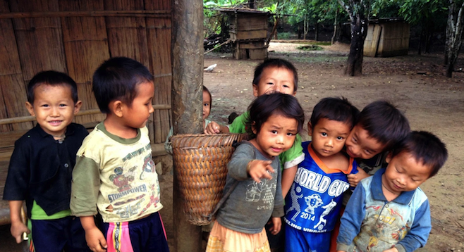 Khmu children in northern Laos, excited to see themselves on camera.