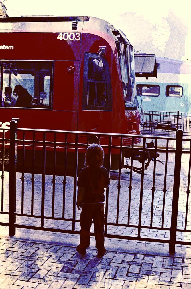 my son Fin, watching the trolley go by at the Santa Fe Depot