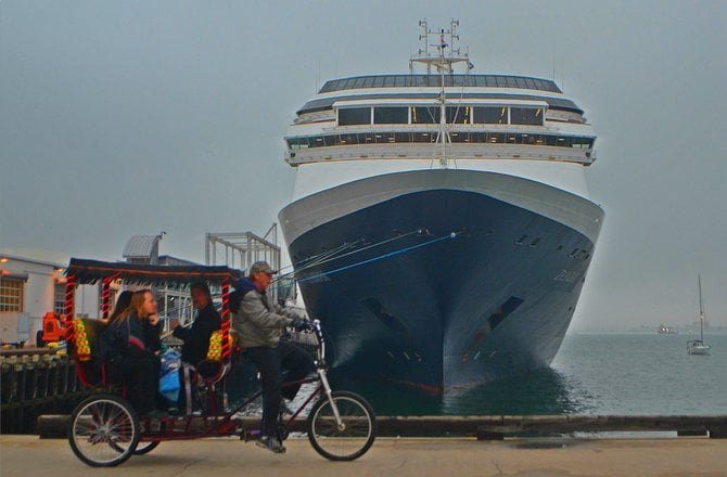 pedicab crossing cruise ship in san diego harbor