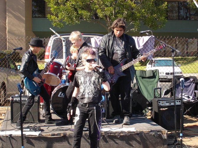 Young ROCK BAND at Koby's SWAP MEET. These kids are actually VERY GOOD talented musicians. Photographed by Robert Chartier.